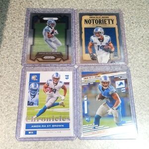 4 card Amon Ra St Brown lot.